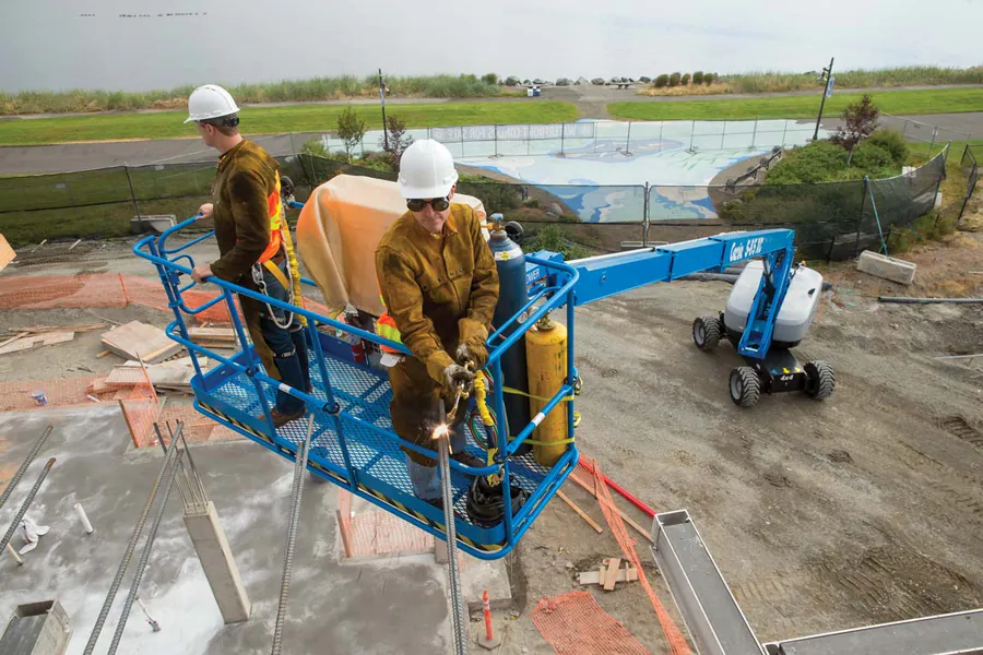 Boom lift operating on site